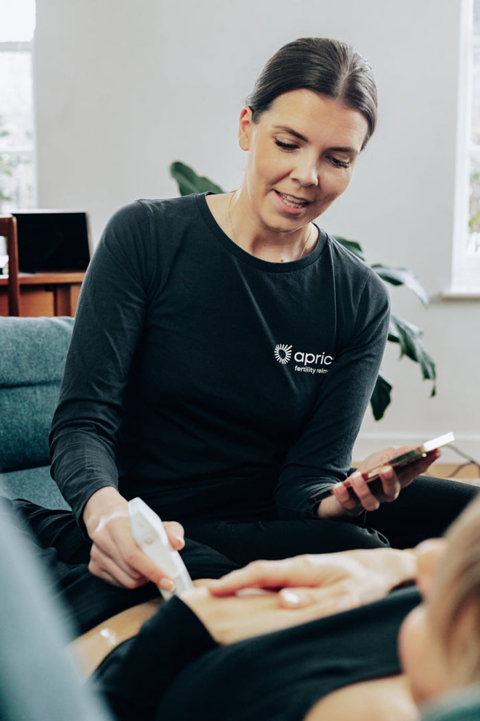 Woman having an ultrasound during fertility treatment