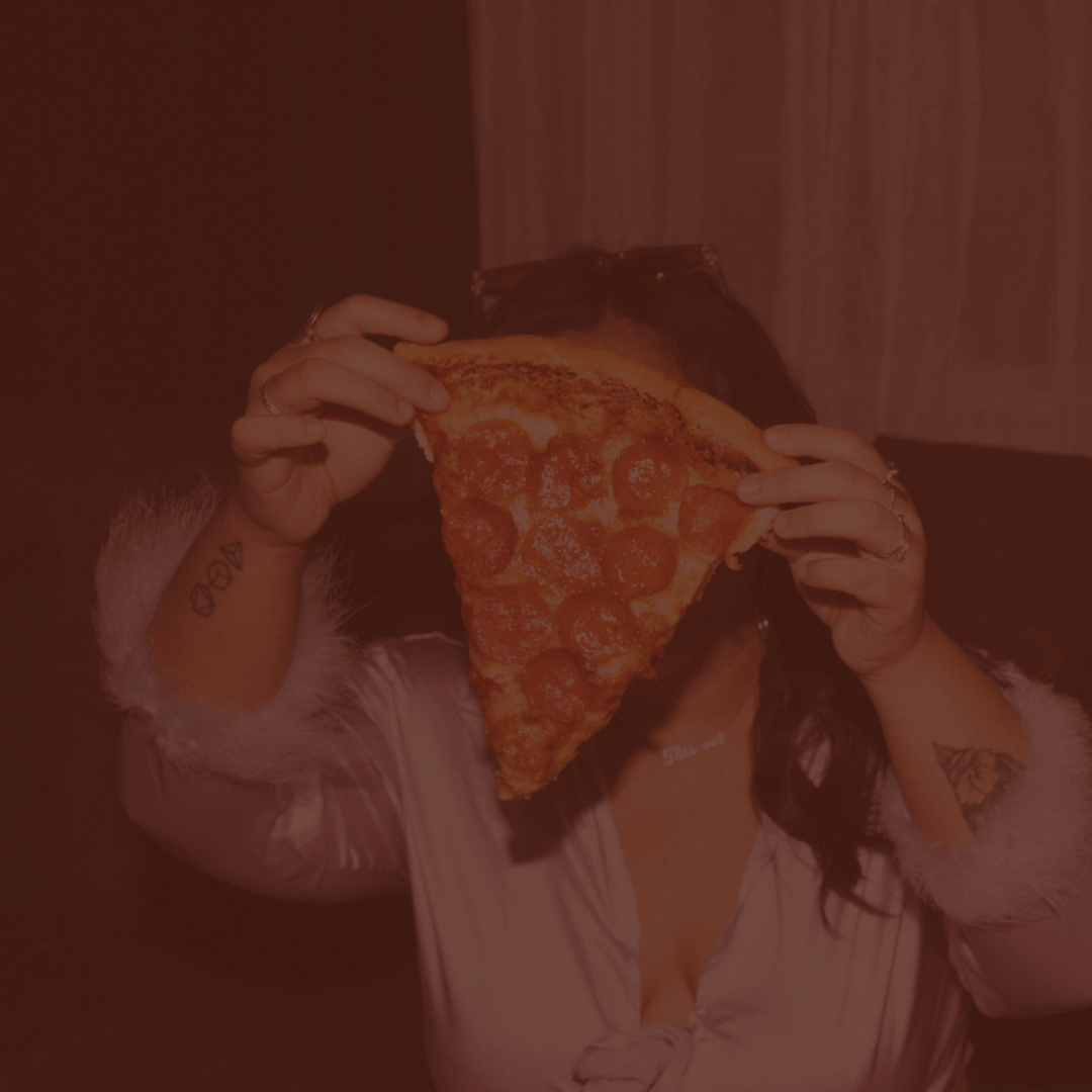 Why Do We Crave Pizza During Our Period? Here's the Science Behind It