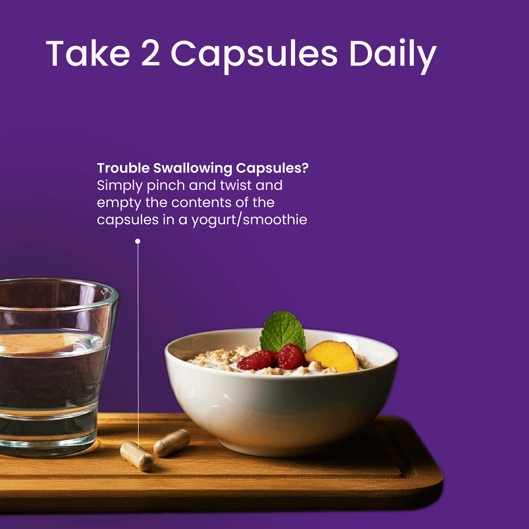 Bowl of cereal with fruit, glass of water, and capsules on a wooden tray with purple background