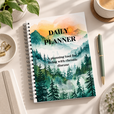 A Daily Planner titled A planning tool for living with chronic disease by Aevum lies on a desk with stationery items.
