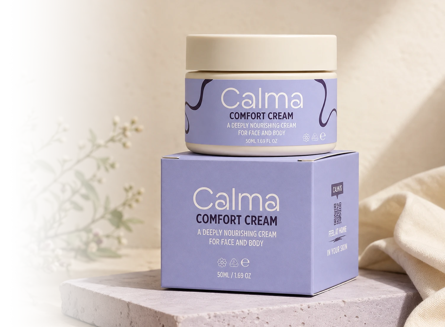 A jar of Calma Comfort Cream sits on top of its matching product box. The packaging is a soft lavender purple with white text and a cream-colored lid, set against a warm beige background with soft shadows and a draped beige fabric.
