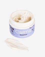 Jar of Calma Ezzence cream with a white background