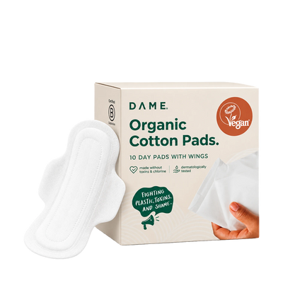 A pack of 10 Dame organic cotton pads on a transparent background