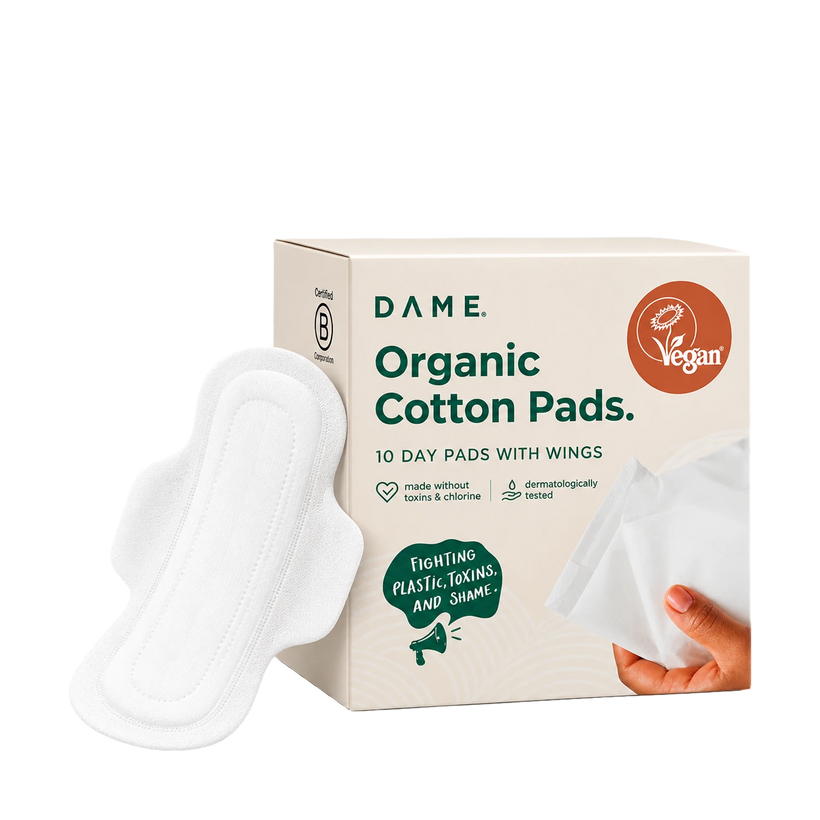A pack of 10 Dame organic cotton pads on a transparent background