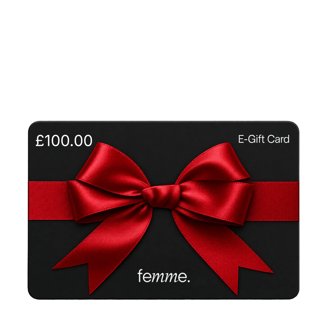 A black E-Gift Card valued at £100.00 with a large red satin bow across the center and the brand name 'femme.