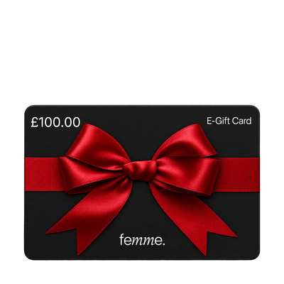 A black E-Gift Card valued at £100.00 with a large red satin bow across the center and the brand name 'femme.