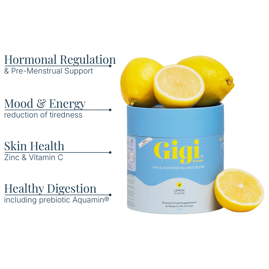 A cylindrical supplement canister labeled Gigi Lemon Flavour, shown with lemons on top and beside it, on a white background with marketing text listing benefits: hormonal regulation and pre-menstrual support, mood and energy, skin health, and healthy digestion including prebiotic Aquamin.