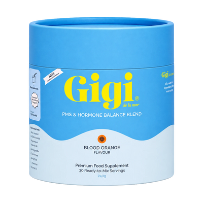 A blue cylindrical canister of Gigi de la mar PMS & Hormone Balance Blend in Blood Orange flavor, shown on a plain white background.