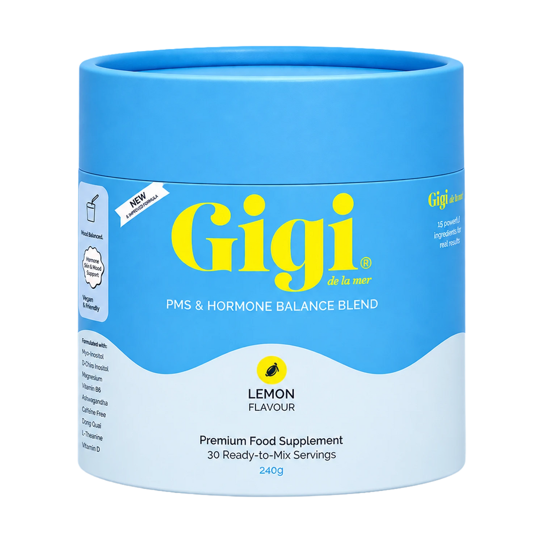 A blue and white cylindrical container of Gigi PMS & Hormone Balance Blend in Lemon Flavour, shown on a plain white background.