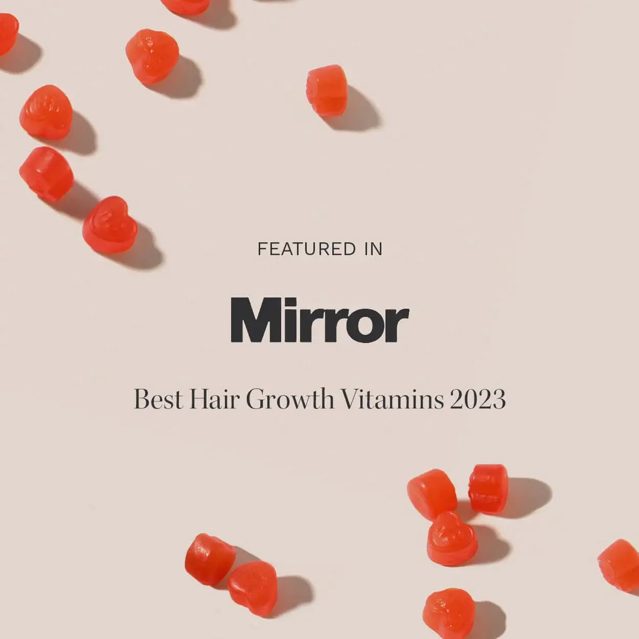 A promotional graphic with text 'FEATURED IN Mirror Best Hair Growth Vitamins 2023'.