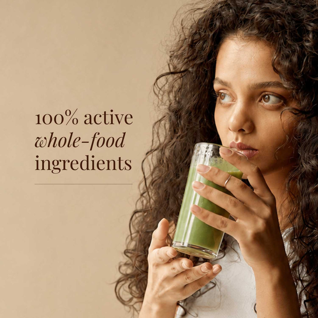 Superfood powder supplement with text for 100% active whole food ingredients on a beige background