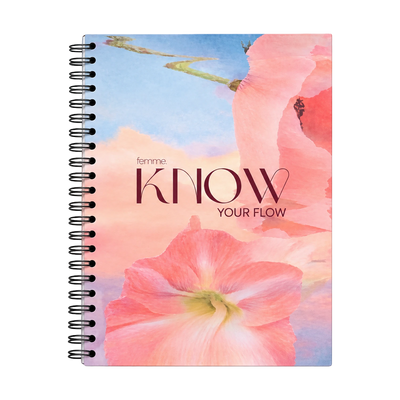 A spiral-bound notebook with a floral cover design featuring pink flowers and the text 'femme KNOW YOUR FLOW' on a white background.