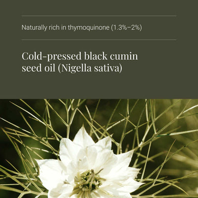 Black seed oil ingredients text on a dark background