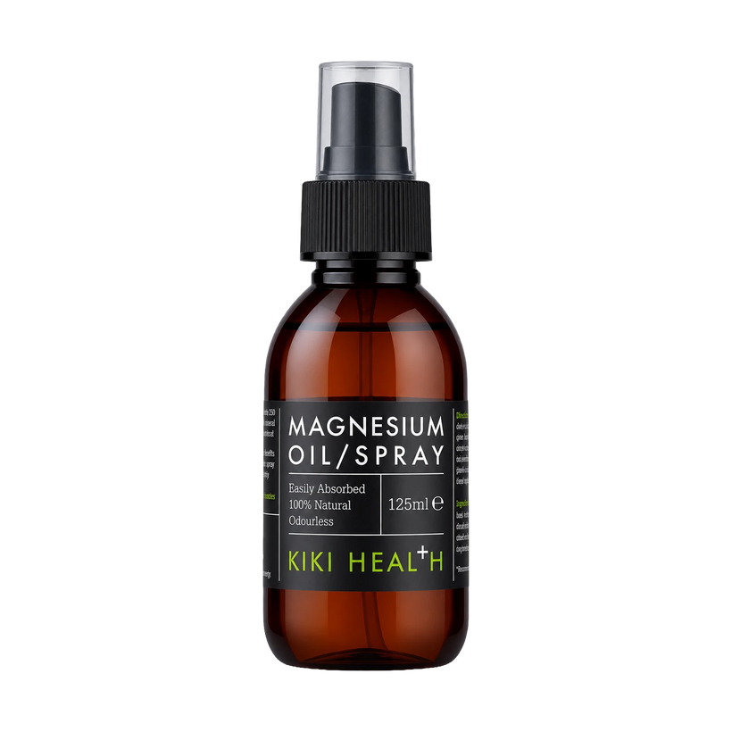 A 125ml amber glass bottle of Kiki Health Magnesium Oil Spray with a black spray nozzle and a black label featuring green brand text, set against a plain white background.