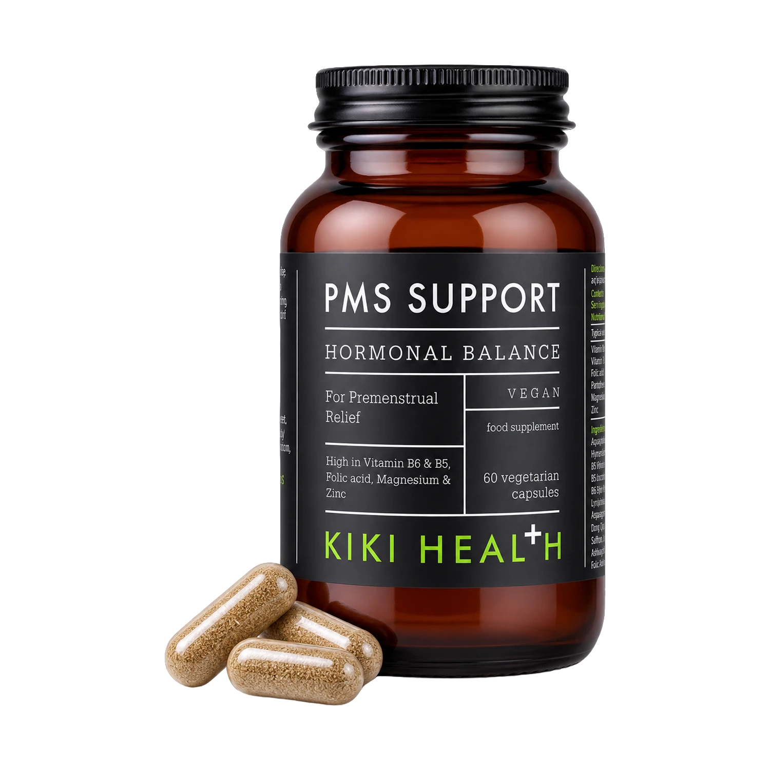 An amber glass supplement bottle labeled 'PMS SUPPORT HORMONAL BALANCE' by Kiki Health, with three tan capsules placed in front on a clean white background.