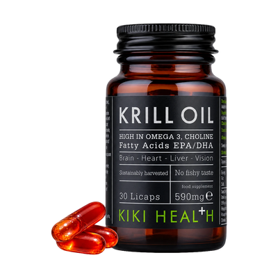 A bottle of Kiki Health+ Krill Oil capsules with three capsules beside it.