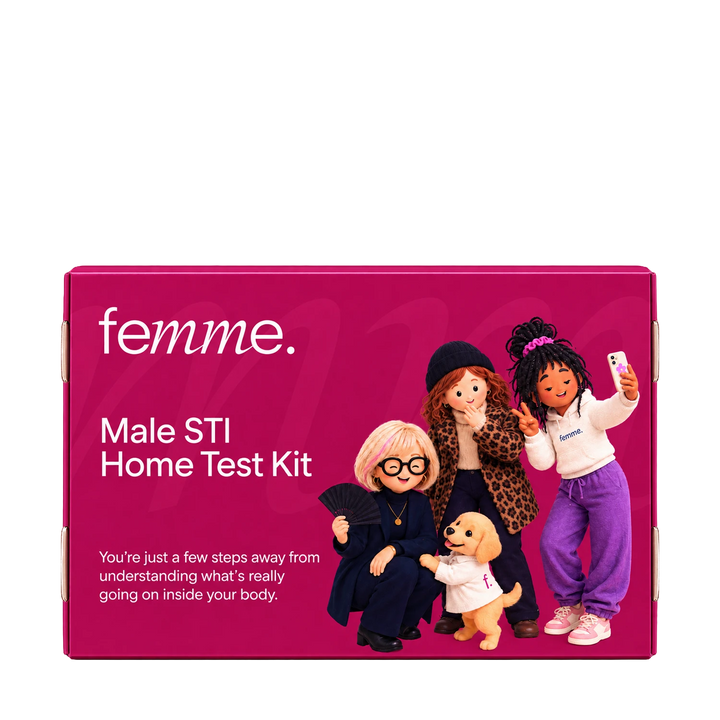A bright pink rectangular product box for the femme Male STI Home Test Kit, featuring white text and illustrations of four diverse women and a small dog on the front.