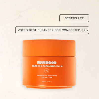 Orange cleansing balm jar with brand name on a white background