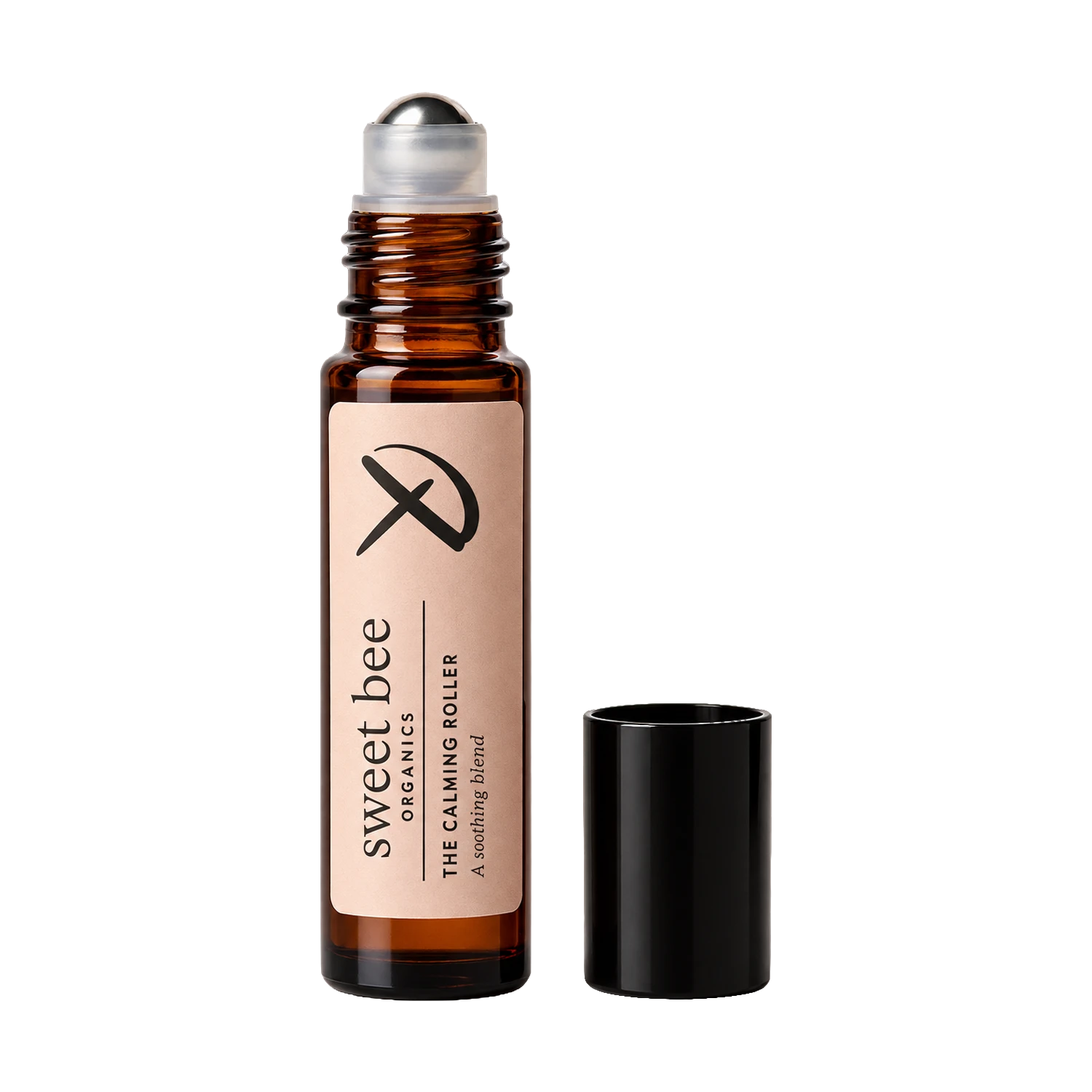 One amber glass roll-on bottle labeled 'sweet bee' is arranged on a transparent background. The bottle is open with its black cap placed beside it.
