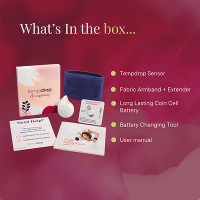 Box of Tempdrop accessories displayed on a dark pink background with text reading 'What's In the box.