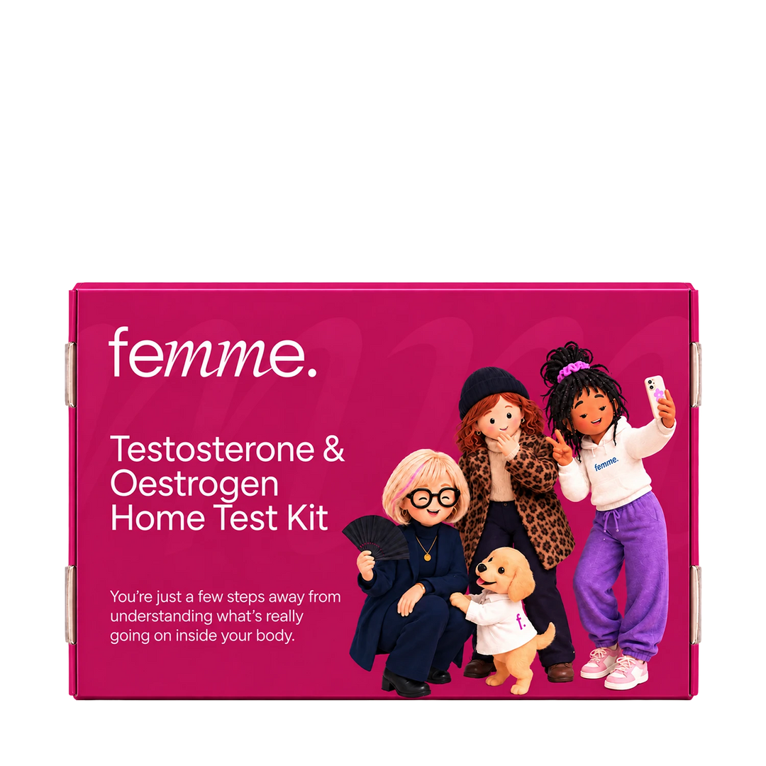 A bright pink rectangular product box for the femme Testosterone & Oestrogen Home Test Kit, shown on a plain white background. The box features white text and an illustration of four cartoon women and a small dog in stylish outfits.