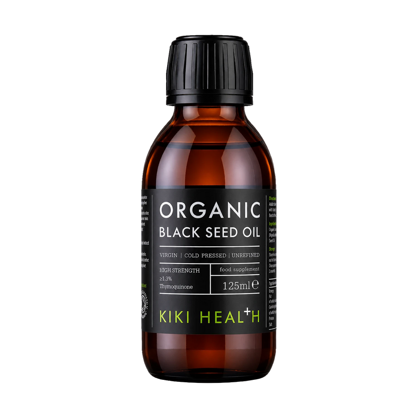 A 125ml bottle of Kiki Health+ Organic Black Seed Oil in an amber glass bottle with a black cap and black label, shown on a solid white background.