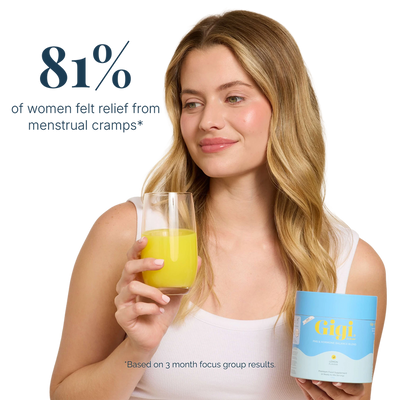 Woman holding a glass and Gigi supplement with information about menstrual cramp relief.