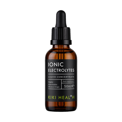 A 50ml amber glass dropper bottle of Kiki Health Ionic Electrolytes liquid concentrate, featuring a black label with white and lime green text, set against a plain white background.