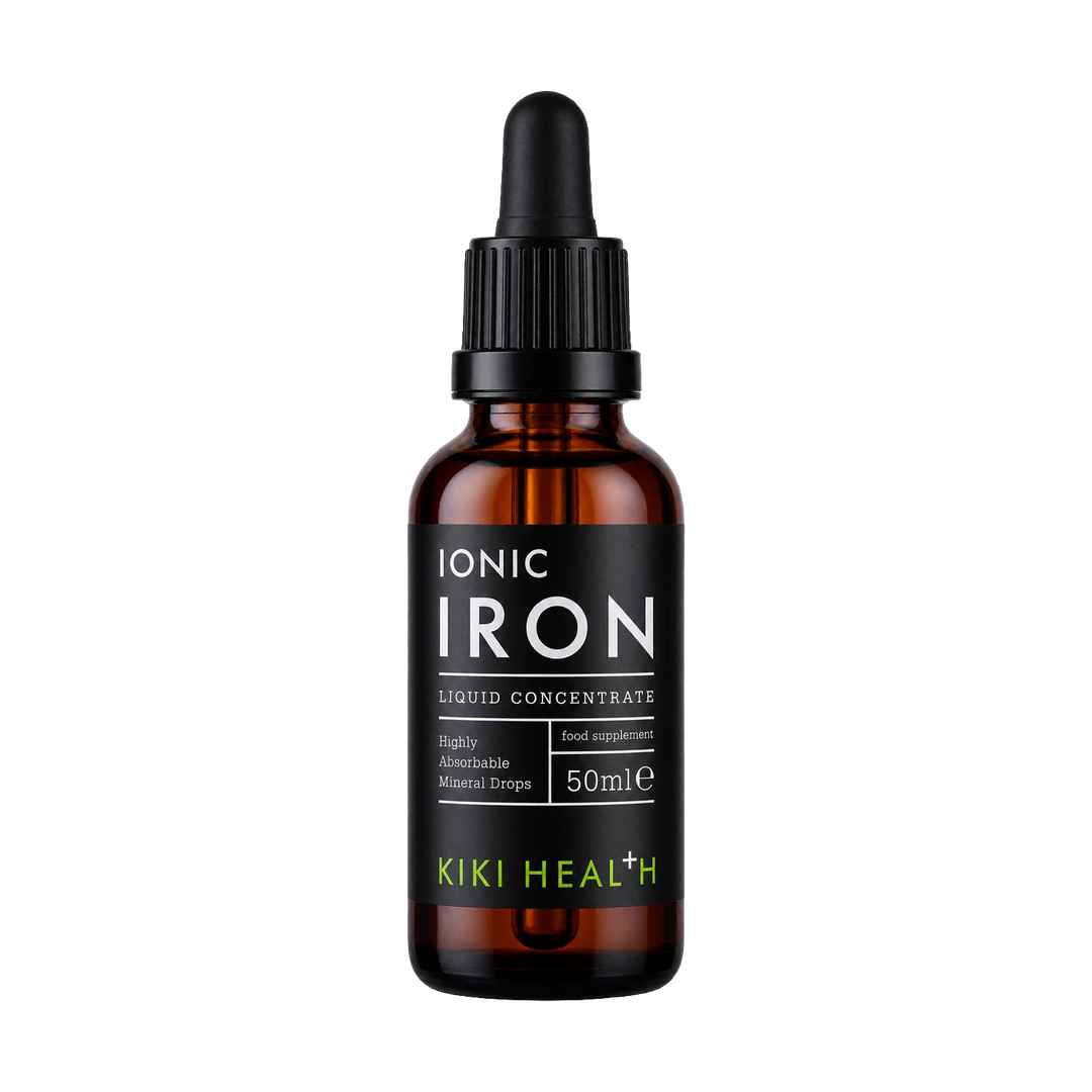 A 50ml amber glass dropper bottle of Kiki Health Ionic Iron Liquid Concentrate, featuring a black label with white and lime green text, and a black dropper cap, set against a plain white background.