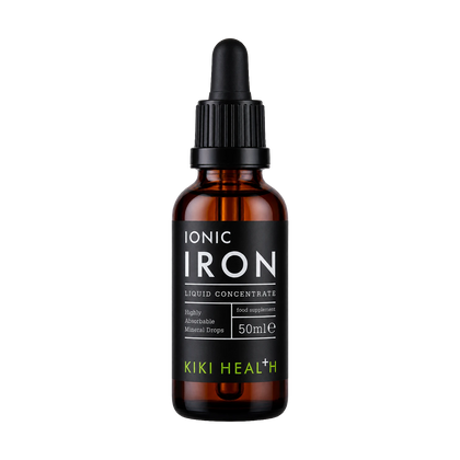 A 50ml amber glass dropper bottle of Kiki Health Ionic Iron Liquid Concentrate, featuring a black label with white and lime green text, and a black dropper cap, set against a plain white background.