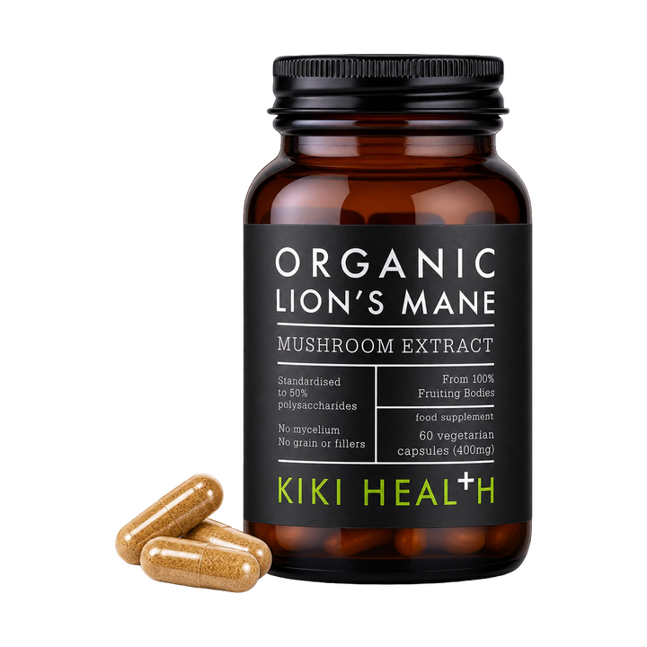 A black supplement bottle labeled 'Organic Lion's Mane Mushroom Extract' by Kiki Health, shown on a white background with three tan capsules placed in front.