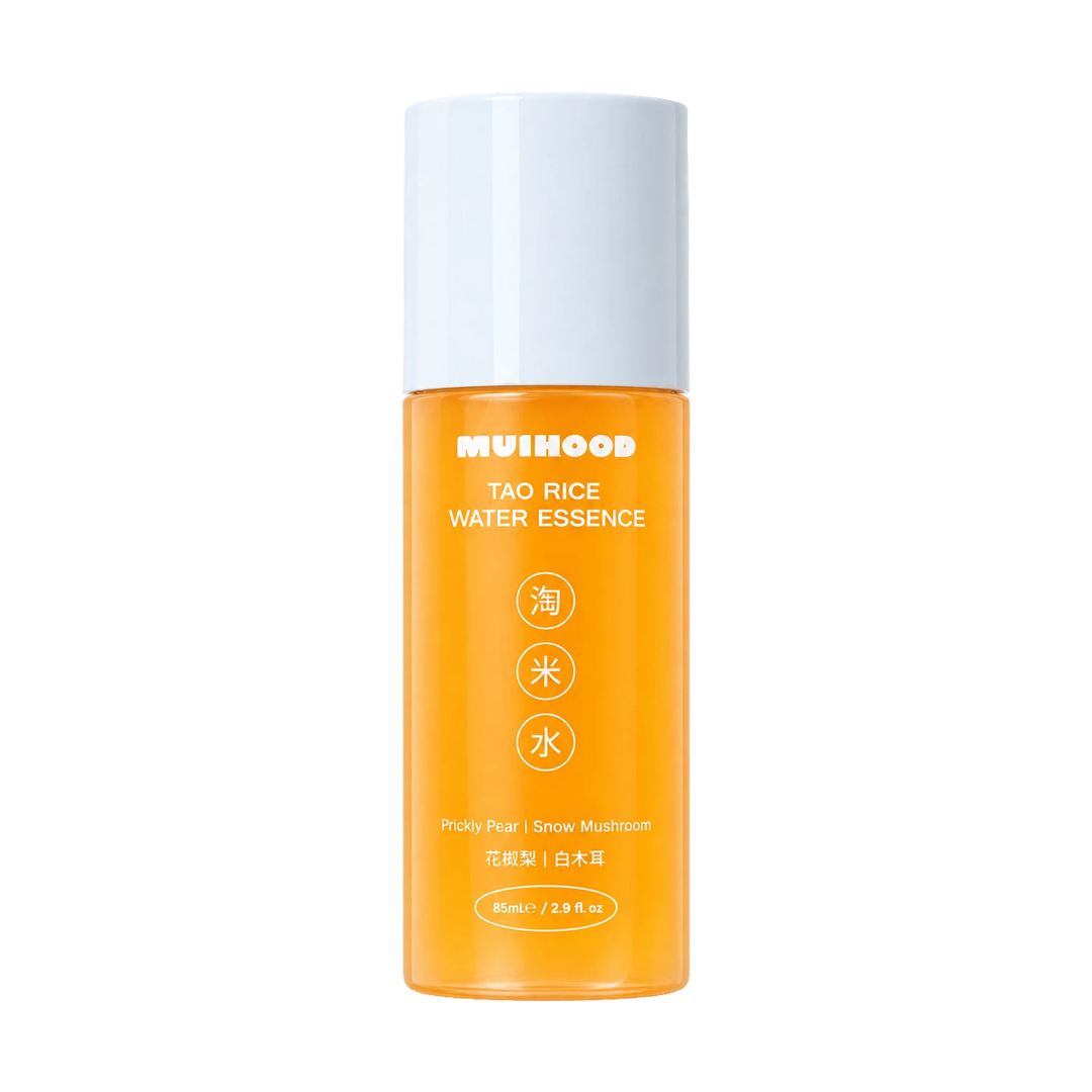 A bottle of MUIHOOD Tao Rice Water Essence with a white cap and a bright orange translucent body, shown on a solid white background.