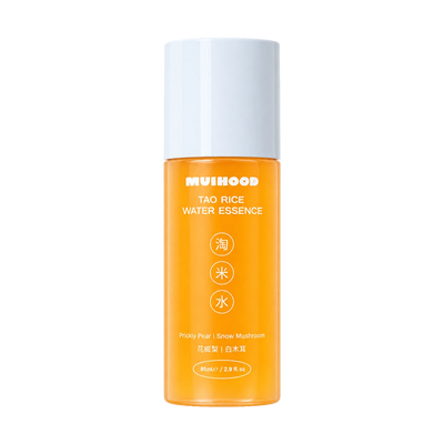 A bottle of MUIHOOD Tao Rice Water Essence with a white cap and a bright orange translucent body, shown on a solid white background.